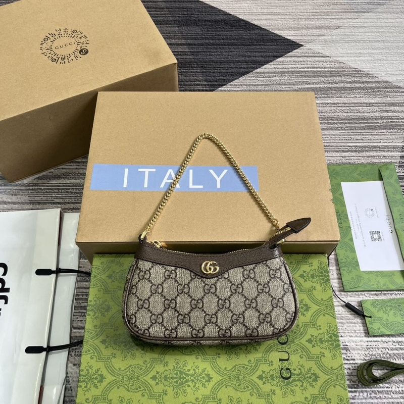 G*u*i top handle bags
